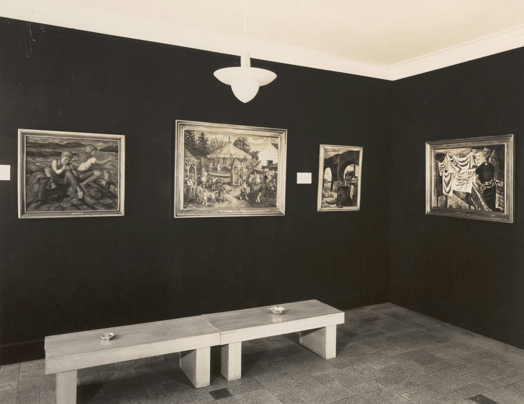 Framed prints on a gallery wall